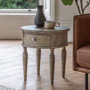 Mustique, rundt sidebord/nattbord med en skuff i rustikk finish